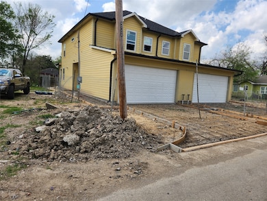 Duplex construction in progress next to the subject lot