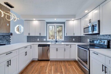 Quartz Counter Tops/SS Appliances