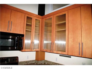 Kitchen - Maple cabinets with contemporary hardwar