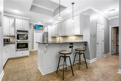 Granite & Stainless w/ Double Ovens, Gas Cooktop &