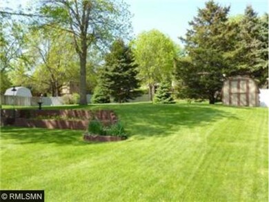 The rear yard is extra deep and wide- perfect for 