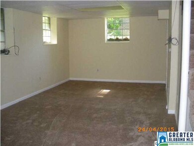 DEN DOWN STAIRS