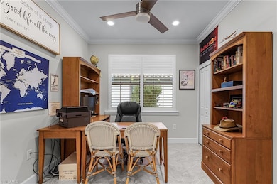 Office with ornamental molding, ceiling fan, and recessed lighting