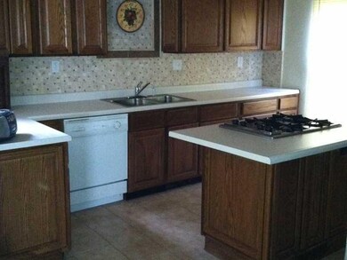Kitchen. New backsplash, island, dishwasher and re