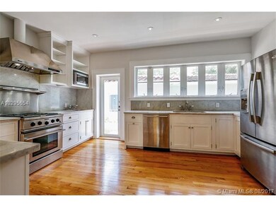 Chef's kitchen has a gas Cook-top and oven plus tw