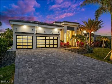 View of front of property with stucco siding, deco