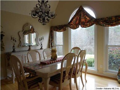 Formal Dining Room -- vaulted ceiling & lots of na