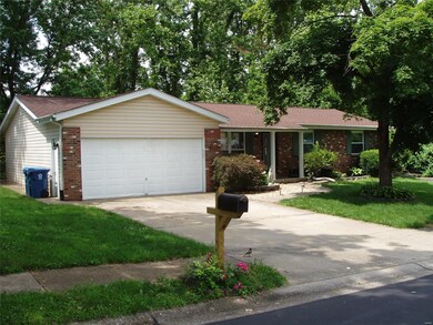 This lovely home sits on a large fenced lot backin