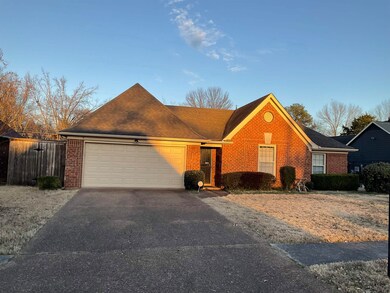 Ranch-style home featuring roof with shingles, bri