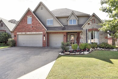 Beautiful brick & stone home with 3 car garage.