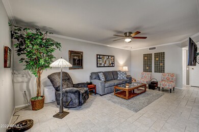 Living room w/Crown molding.