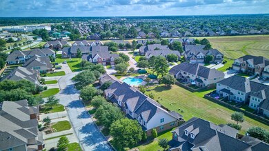 This aerial photo showcases a picturesque suburban