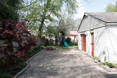 The detached one car garage offers loads