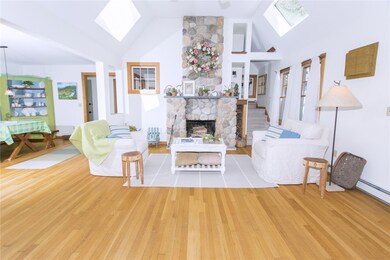 Open Living Room w/ Stone Fireplace