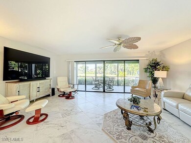 Living room featuring ceiling fan and plenty of na