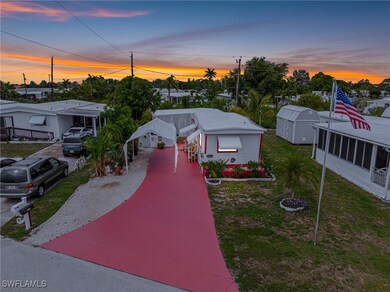 View of front of home featuring a carport, a front