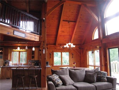 View from family room into dining room & kitchen