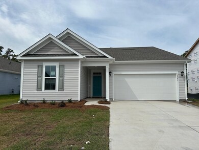 View of front of house featuring a garage and a fr