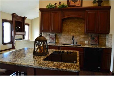 Chef's kitchen with gorgeous granite.