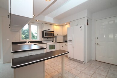 .... fully equipped w/ appliances plus ceramic tile flooring.