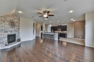 Big & Open Floorplan. Large Family Area Opens to Kitchen & Breakfast. Great for Daily Living and Entertaining Lots of Family & Friends.  Beautiful Gas Log Fireplace, perfect for Christmas Stocking & Cozy Fires.