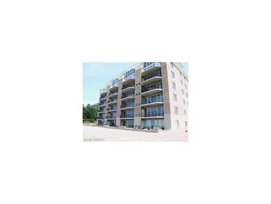 Rear of midrise building, this unit for sale is th