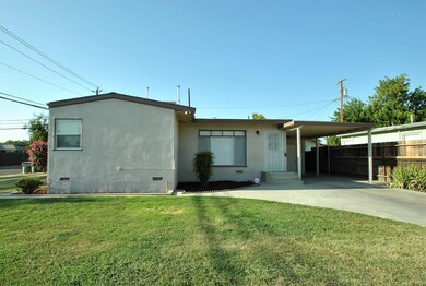 This home is located on a corner lot, has new roof
