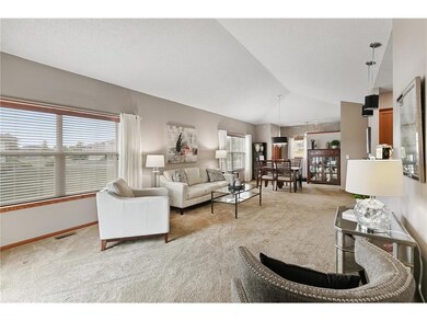 Large windows, high ceilings and open floor plan b
