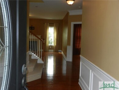 Foyer with real hardwood flooring