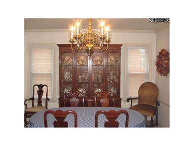 Formal Dining Room with chair rail and crown moldi