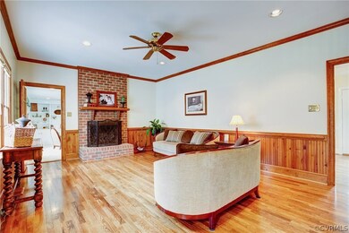 Family Room with wood burning fireplace.