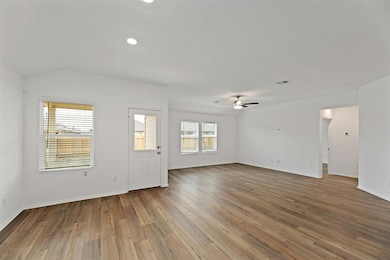 Unfurnished living room with light wood finished floors, recessed lighting, and a ceiling fan