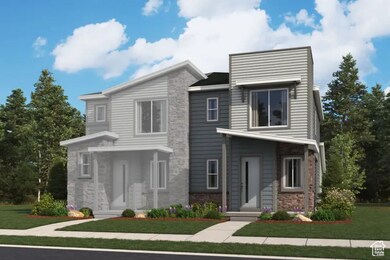 Contemporary house with a front yard and brick siding