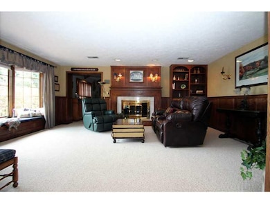 Living Room. Note the beautiful fireplace and larg