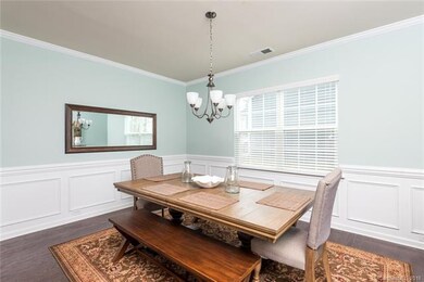 Formal dining room different view.