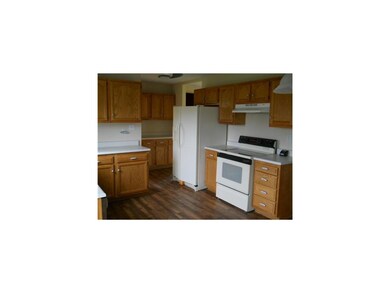 Kitchen. Fully appointed kitchen w/ adjacent laund