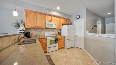 Upgraded granite countertops and maple cabinets an