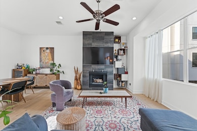 Bright and spacious living area with modern furnis