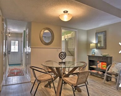 View back toward entry hall- Kitchen to right
