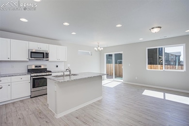 **Photos of previously built home of same floor plan.