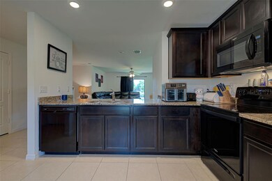 looking through the kitchen to the main living are