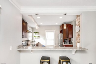 Enjoy coffee, cocktails or layout a great spread of appetizers at the built in bar!