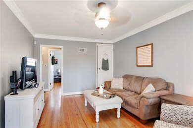Living room with fresh neutral paint throughout an