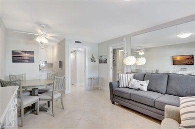 Tiled living room with ceiling fan
