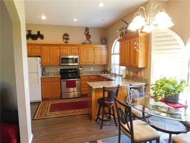 Kitchen and dining are open to each other.