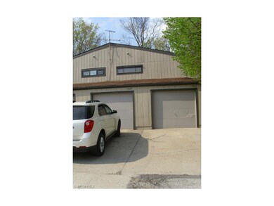 ATTACHED GARAGE WITH A GARAGE DOOR OPENER...VERY C