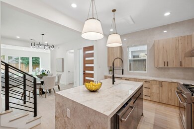 The formal dining area is expertly located between