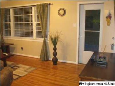 Living room offers hardwood flooring and brand-new