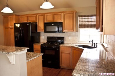 All black appliances stay with home.  Under counte