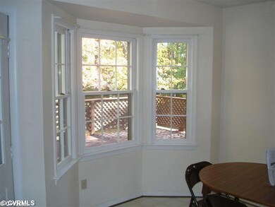 Kitchen - Bay window overlooking rear deck and fen